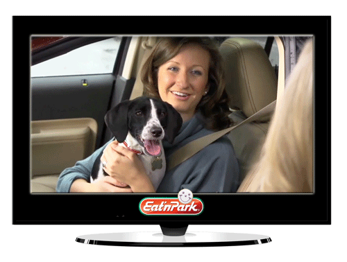 Meet Molly (and her human, Amanda)!
Molly steals that show in our latest takeout commercials. She loves Smiley Cookies, bacon, and long romps at the dog park. And she always rides along when her humans pick up takeout from Eat'n Park, so she can get her doggie biscuit from the takeout window!